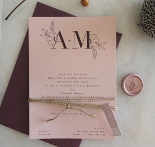 romance on blush wedding invitation